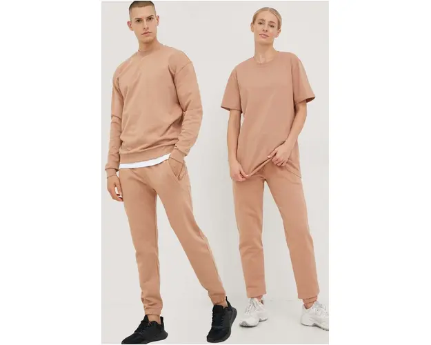 Arkk Copenhagen pantaloni de trening din bumbac unisex, culoarea bej, neted