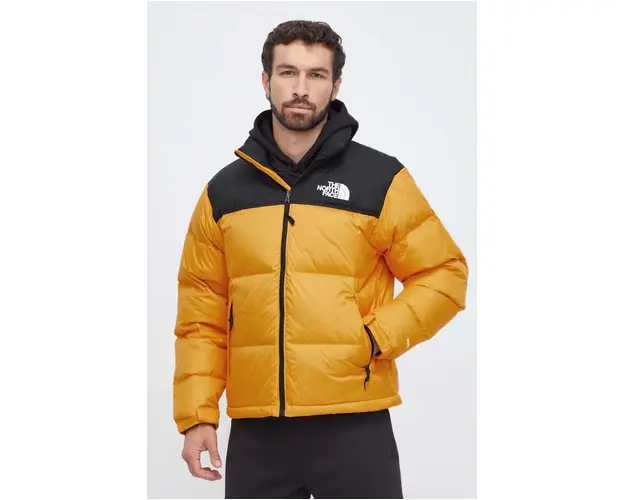 The North Face geaca de puf barbati, culoarea galben, de iarna