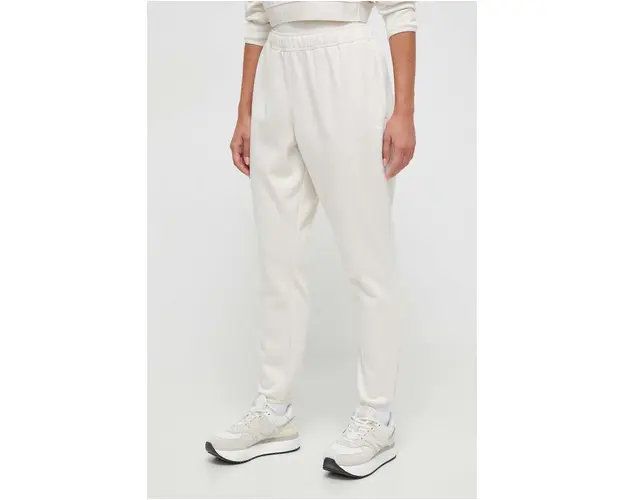 Puma pantaloni de trening culoarea bej, neted