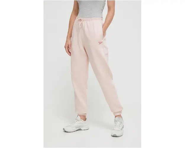 Reebok pantaloni de trening culoarea roz, neted