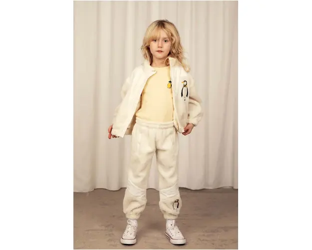 Mini Rodini pantaloni de trening pentru copii culoarea bej, cu imprimeu