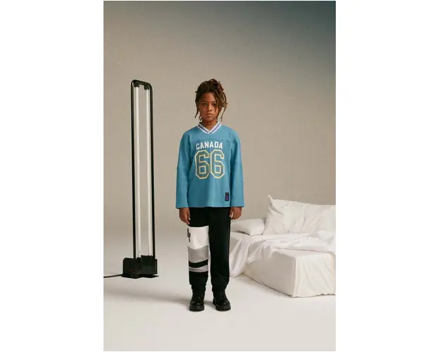 Sisley pantaloni de trening din bumbac pentru copii culoarea negru, modelator