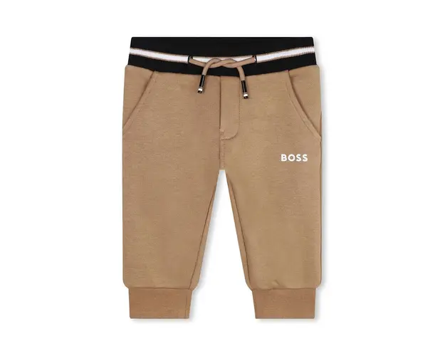 BOSS pantaloni de trening pentru bebelusi culoarea bej, cu imprimeu, J51272