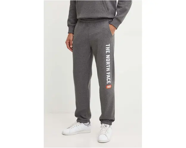 The North Face pantaloni de trening Pant Varsity Graphic culoarea gri, cu imprimeu, NF0A89DPDYY1