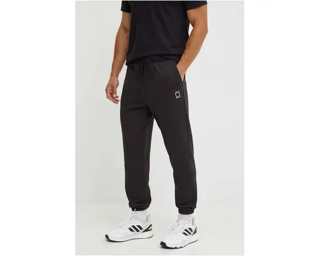 Puma pantaloni de trening din bumbac culoarea negru, neted, 627595