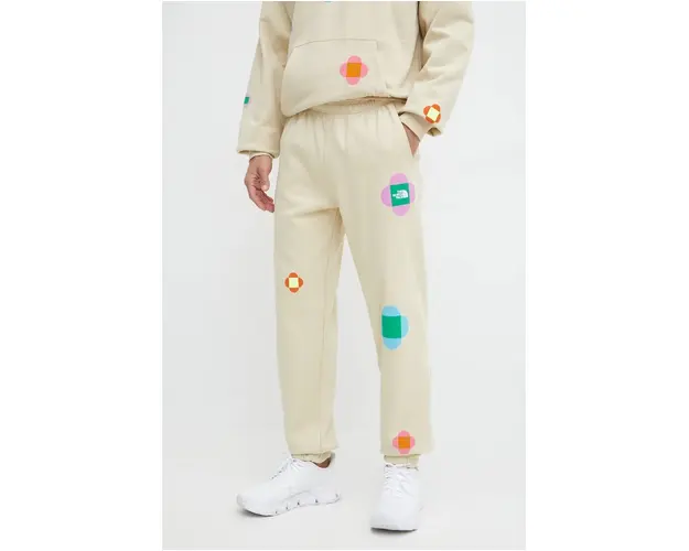 The North Face pantaloni de trening din bumbac TNF x Yinka Ilori culoarea bej, cu imprimeu, NF0A8AQ23X41