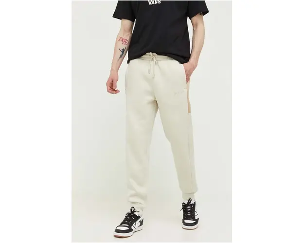 Nicce pantaloni de trening culoarea bej, cu imprimeu
