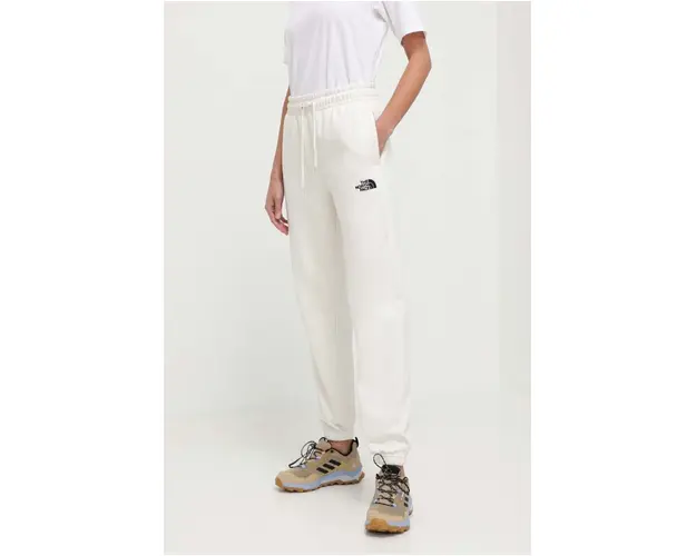 The North Face pantaloni de trening culoarea bej, neted