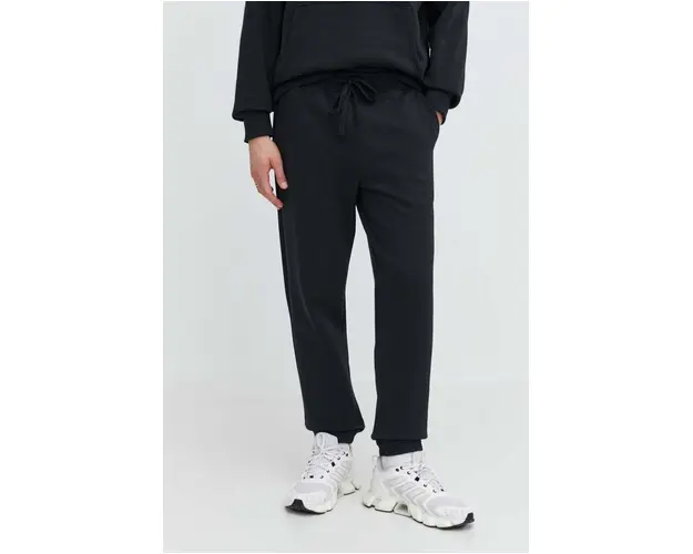 Herschel pantaloni de trening din bumbac culoarea negru, neted