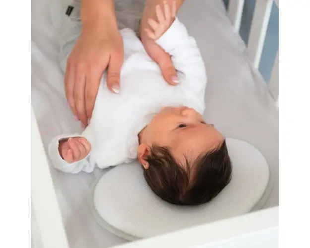 Perna ergonomica Doomoo pentru capul bebelusului